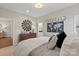 Comfortable bedroom featuring a wood dresser, decorative mirror, and world map at 149 Glenn Dr, Mooresville, NC 28115