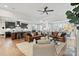 Spacious living room open to the kitchen and dining area, featuring hardwood floors and comfortable seating at 149 Glenn Dr, Mooresville, NC 28115