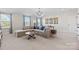 Inviting living room with a large sectional sofa, modern lighting, and stylish decor at 149 Glenn Dr, Mooresville, NC 28115