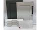 A curated selection of interior design materials that includes cabinet and tile samples at 149 Glenn Dr, Mooresville, NC 28115