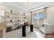 Office with natural light from large windows, stylish shelving, and modern furnishings at 149 Glenn Dr, Mooresville, NC 28115