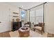 Cozy sitting room featuring comfortable chairs, stylish decor, and a wine rack for relaxation and entertaining at 149 Glenn Dr, Mooresville, NC 28115