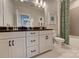 Modern bathroom with double vanity, framed mirror, and shower with glass door and tiled walls and shower at 153 Glenn Dr, Mooresville, NC 28115