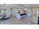 Bright and spacious kitchen featuring a large island, stainless steel appliances, and adjacent dining area at 153 Glenn Dr, Mooresville, NC 28115