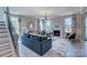 Spacious living room with fireplace, stylish furnishings, and ample natural light creates inviting atmosphere at 153 Glenn Dr, Mooresville, NC 28115