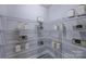 Organized pantry with white wire shelving and decorative storage containers provides efficient storage solutions at 153 Glenn Dr, Mooresville, NC 28115