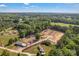Panoramic view showing property with a greenhouse and surrounding woodland at 159 Old Home Pl, China Grove, NC 28023