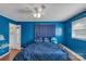 Bright bedroom with blue walls and wood floors at 159 Old Home Pl, China Grove, NC 28023