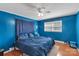 Cozy bedroom with blue walls, matching bedding, and plenty of natural light at 159 Old Home Pl, China Grove, NC 28023
