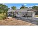 Charming home featuring a rocking-chair front porch and an attached covered carport at 159 Old Home Pl, China Grove, NC 28023