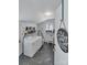 Laundry room has a washer, dryer, shelving and sink at 159 Old Home Pl, China Grove, NC 28023