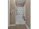 Accessible shower includes seating, safety bars, and adjustable showerhead at 159 Old Home Pl, China Grove, NC 28023