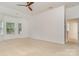 Bright bedroom featuring neutral carpet and doorways to other rooms in the home at 1654 Scotch Pine Ln, Fort Mill, SC 29708