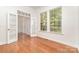 Office featuring hardwood floors, double doors, and natural light at 1654 Scotch Pine Ln, Fort Mill, SC 29708
