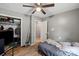 Bedroom with natural light, hardwood floors and an open closet for storage at 205 Pinehurst Dr, Kings Mountain, NC 28086