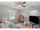 Bedroom with natural light, hardwood floors and a ceiling fan with light at 205 Pinehurst Dr, Kings Mountain, NC 28086
