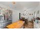 Eat-in kitchen with stainless refrigerator and wooden table and dining set at 205 Pinehurst Dr, Kings Mountain, NC 28086