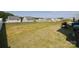 Large backyard features a flat lot with newly installed grass and is ready for entertaining at 2210 Transatlantic Ave, Charlotte, NC 28215