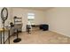 Bedroom features carpet floors, neutral walls, and natural light from window at 2210 Transatlantic Ave, Charlotte, NC 28215