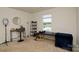 Bedroom features carpet floors, neutral walls, and natural light from window at 2210 Transatlantic Ave, Charlotte, NC 28215