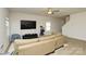 Inviting living room with a large sectional sofa, TV, and a cozy cat tree at 2210 Transatlantic Ave, Charlotte, NC 28215