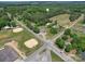 Aerial view of the property highlighting its location near a ball field and multiple roads at 225 N Main St, Mount Pleasant, NC 28124