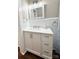 Bathroom with modern vanity, fixtures, and beadboard walls at 229 W Gray Ave, Mooresville, NC 28115