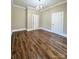 Large bedroom features hardwood floors, natural light, and two closets at 229 W Gray Ave, Mooresville, NC 28115
