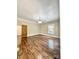 Spacious bedroom features hardwood floors, a sliding barn door, and natural light at 229 W Gray Ave, Mooresville, NC 28115