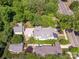 An overhead view showcases the property's layout, with a landscaped yard and charming outdoor living area at 2304 Commonwealth Ave, Charlotte, NC 28205