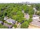 This overhead shot presents a charming home in a leafy neighborhood, close to the city's skyline at 2304 Commonwealth Ave, Charlotte, NC 28205