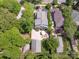A high-angle view highlights the property's well-manicured lawn and private outdoor spaces at 2304 Commonwealth Ave, Charlotte, NC 28205