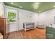 Well-appointed Bedroom featuring a modern crib, plush rocking chair, and stylish decor for a cozy and inviting space at 2304 Commonwealth Ave, Charlotte, NC 28205
