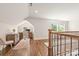Spacious hallway with hardwood floors, natural light, and versatile space for a home office setup at 2304 Commonwealth Ave, Charlotte, NC 28205