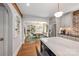 Open layout from kitchen into dining room and formal living room area at 2304 Commonwealth Ave, Charlotte, NC 28205