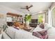 Open floor plan featuring living room with large windows and view into modern kitchen at 2304 Commonwealth Ave, Charlotte, NC 28205