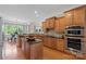 Gourmet kitchen with a center island, granite countertops and stainless steel appliances at 2817 Bevis Ln, Waxhaw, NC 28173