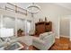 Spacious living room with high ceilings, columns, and plenty of seating at 2817 Bevis Ln, Waxhaw, NC 28173