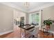 Bright home office with a stylish desk, chair, and a view to the home's entry at 2817 Bevis Ln, Waxhaw, NC 28173