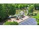 Neighborhood playground featuring slides and climbing structures, plus a peaceful pond with water fountain in background at 2817 Bevis Ln, Waxhaw, NC 28173