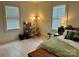 Cozy bedroom with natural light, a comfortable bed, and a dedicated study area at 300 W Thomas St, Salisbury, NC 28144
