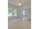 Bright dining room featuring hardwood floors, chandelier, and lots of windows at 300 W Thomas St, Salisbury, NC 28144