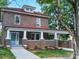 Charming brick home features a lovely front porch, offering a relaxing space to enjoy the outdoors at 300 W Thomas St, Salisbury, NC 28144