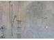 Modern shower stall with marble tiling, rainfall shower head, and built-in shelving at 300 W Thomas St, Salisbury, NC 28144