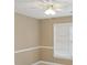 Modest bedroom with a ceiling fan, a window and cream colored walls at 3104 Highgate Dr, Fort Mill, SC 29715