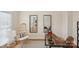 Bright office space with unique chair, desk, and mirrors, creating a stylish and functional work area at 3104 Highgate Dr, Fort Mill, SC 29715