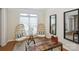 Bright office space with unique chairs and a rustic desk, creating a stylish and functional work area at 3104 Highgate Dr, Fort Mill, SC 29715