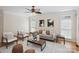 Comfortable living room with hardwood floors, ceiling fan, and modern decor at 3104 Highgate Dr, Fort Mill, SC 29715