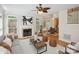 Open-concept living room and dining area with hardwood floors and abundant natural light at 3104 Highgate Dr, Fort Mill, SC 29715