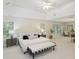 Spacious main bedroom featuring tray ceilings, many windows, and a sitting area at 3104 Highgate Dr, Fort Mill, SC 29715
